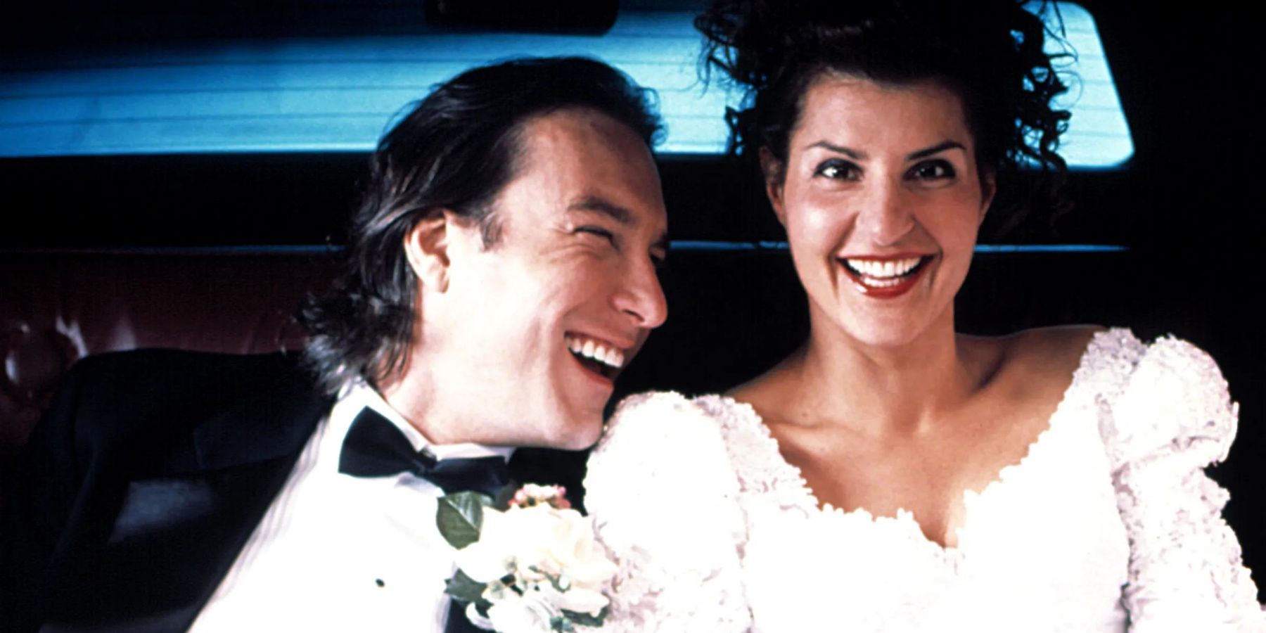 John Corbett and Nia Vardalos in My Big Fat Greek Wedding getaway car