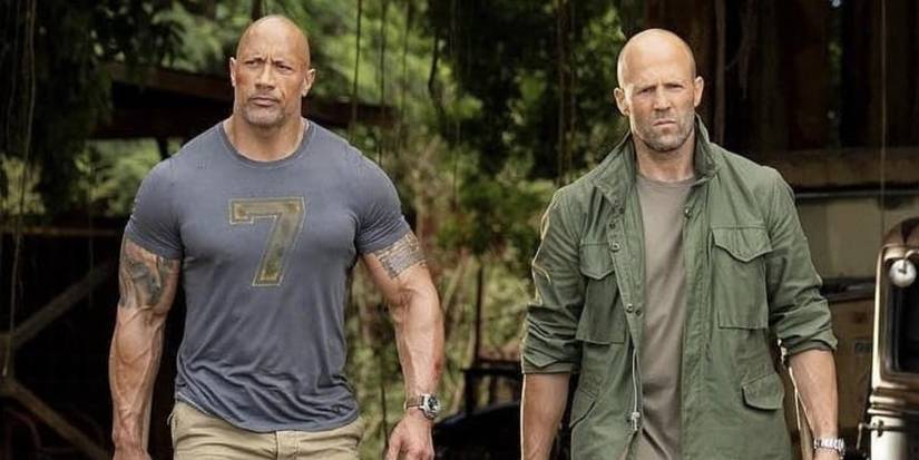 Hobbs (Dwayne Johnson) and Shaw (Jason Statham) walk toward battle in Hobbs & Shaw