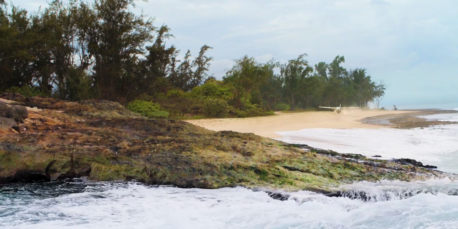 This image shows the water washing up on the beach