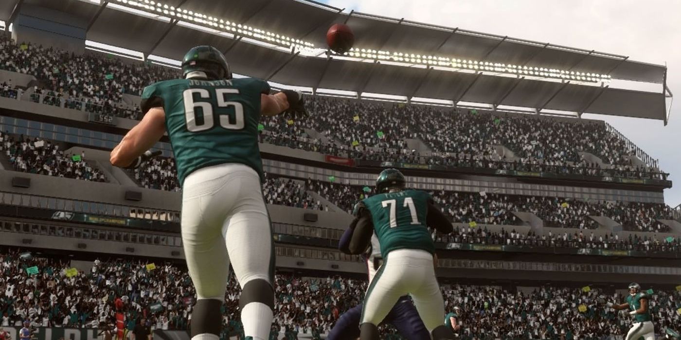 Lane Johnson, #65, reaches for a pass in a screenshot from Madden.