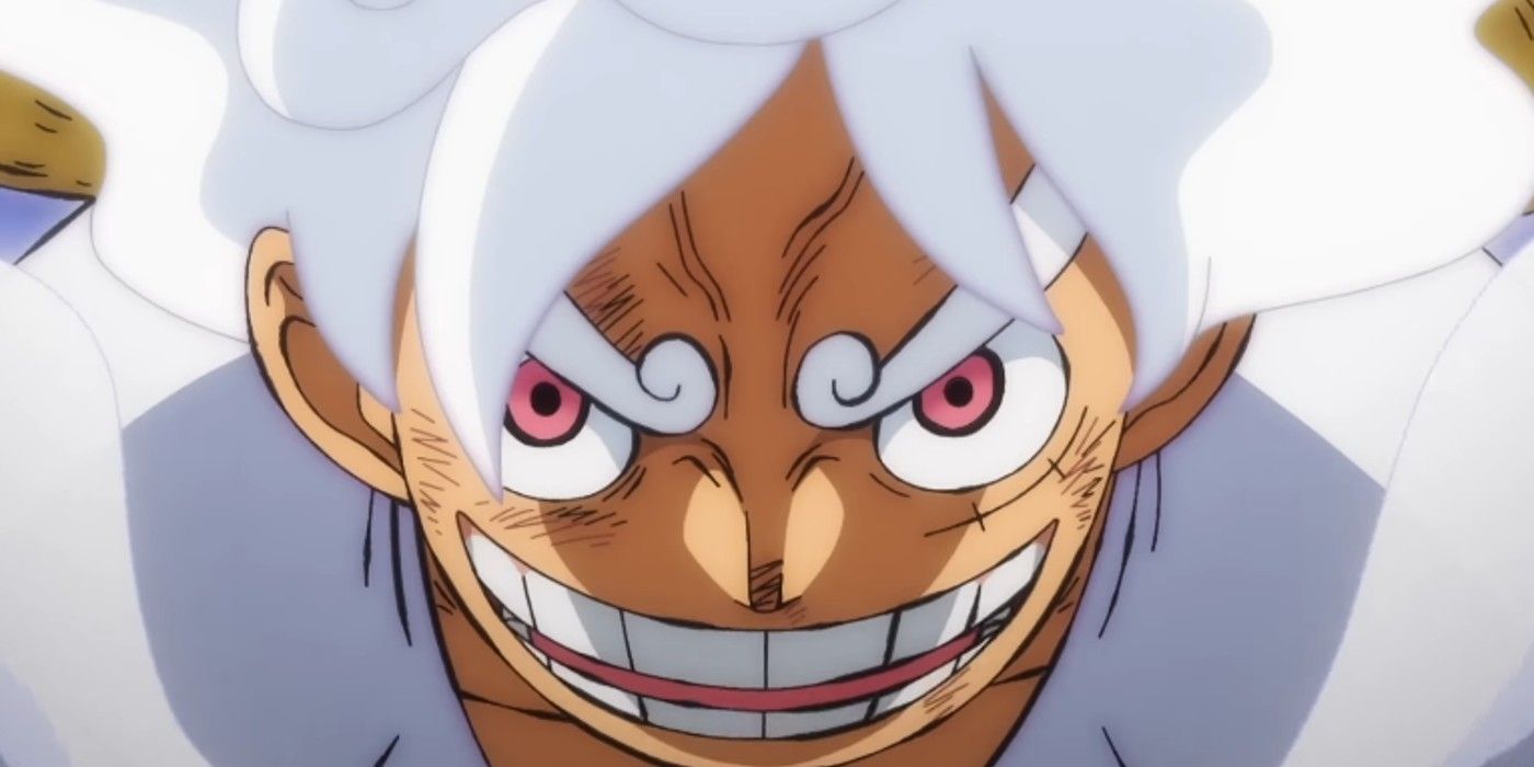 One Piece's Luffy gives a wild-eyed grin while in Gear 5 mode.