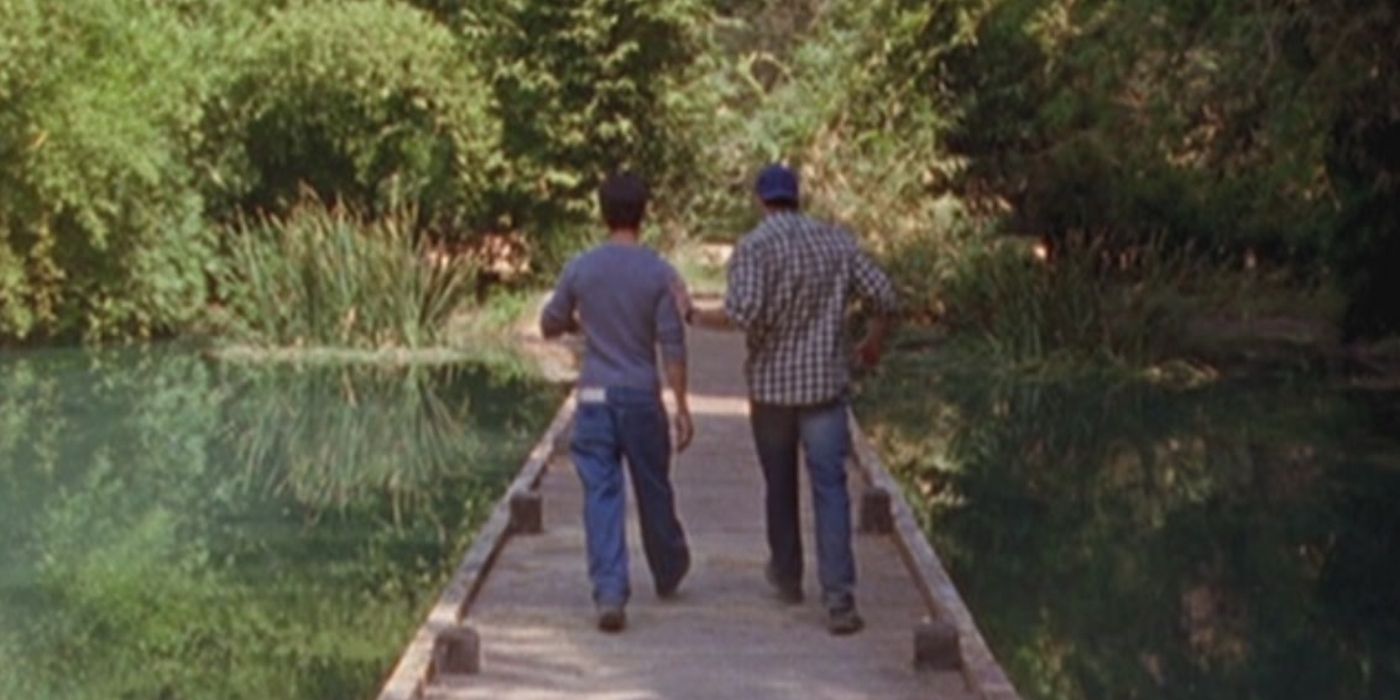 Luke pushes Jess into the lake in Gilmore Girls