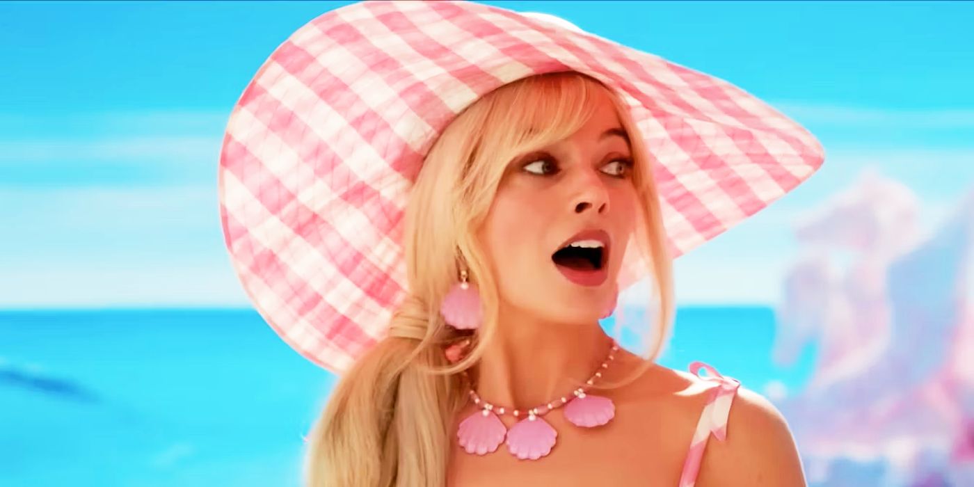 Margot Robbie with her mouth agape as Barbie.