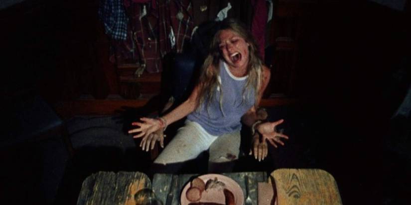 Sally (Marilyn Burns) bound to a chair at the dinner table in Texas Chain Saw Massacre
