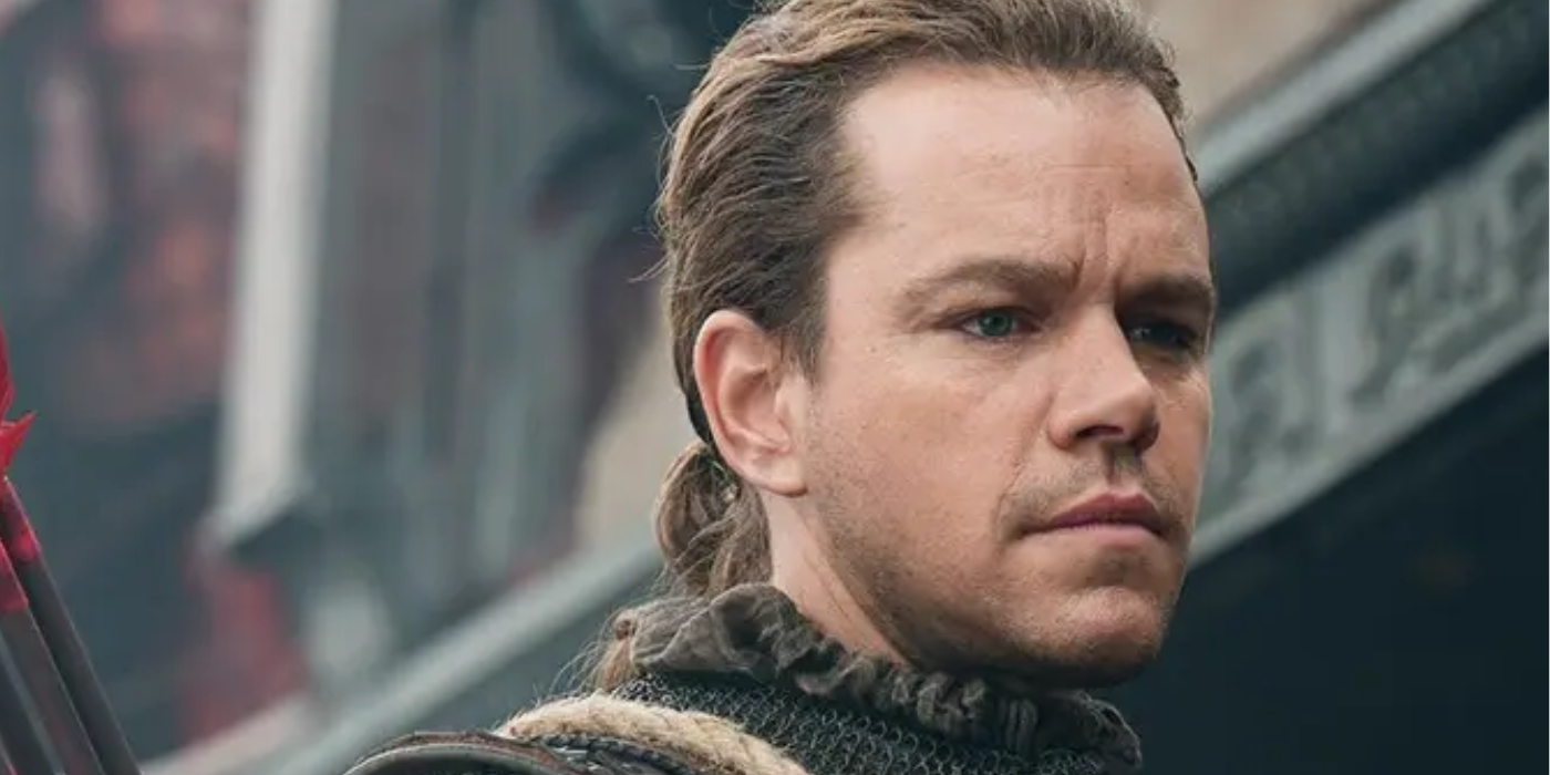 Matt Damon In THe Great Wall with his hair tied back, looking stoic 
