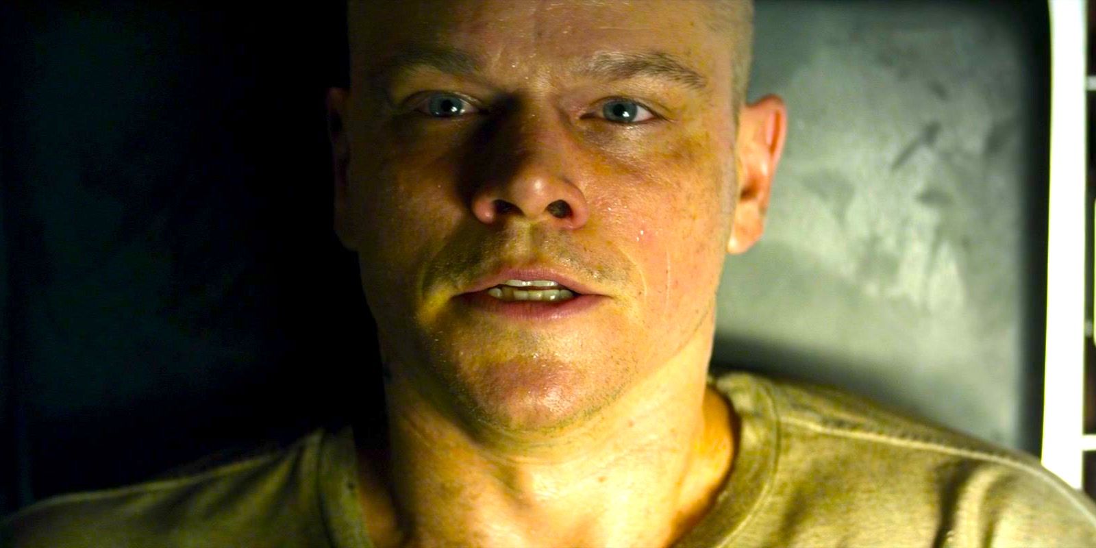 Matt Damon Lying Face Up in Elysium