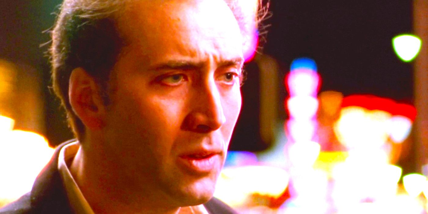Nicolas Cage looking serious against the bright lights of the Strip in Leaving Las Vegas