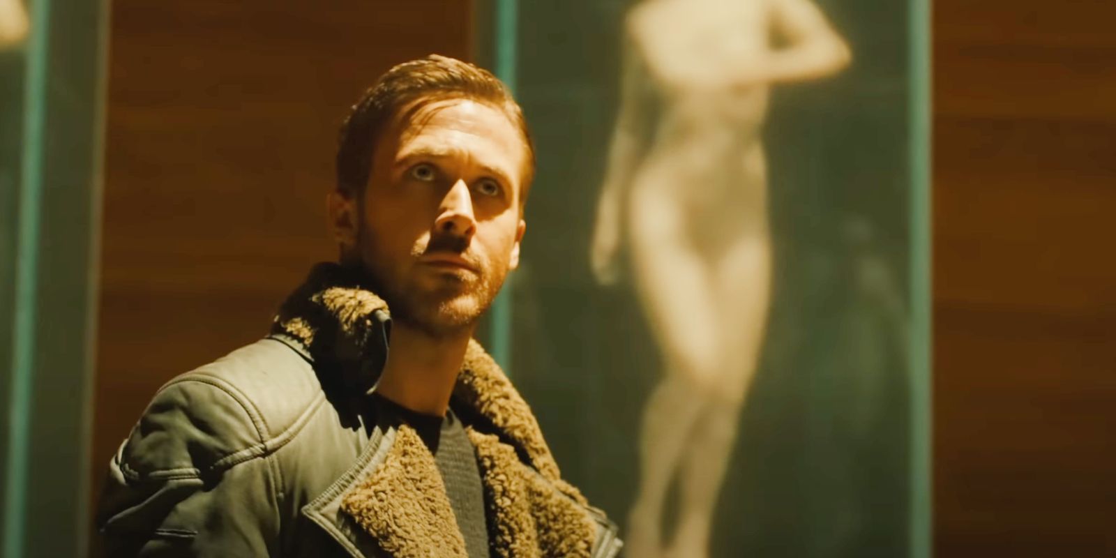 Officer K in Blade Runner 2049 looking up stoically