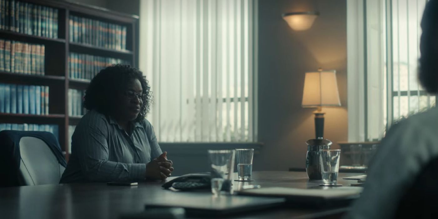 Edie talks to an investigator in Painkiller.