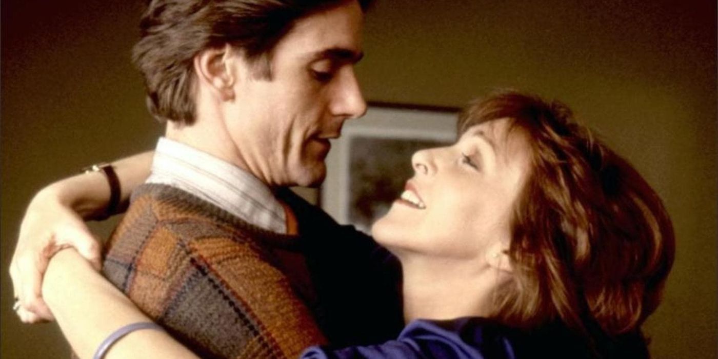 Patricia Hodge hugging and looking at Jeremy Irons in Betrayal