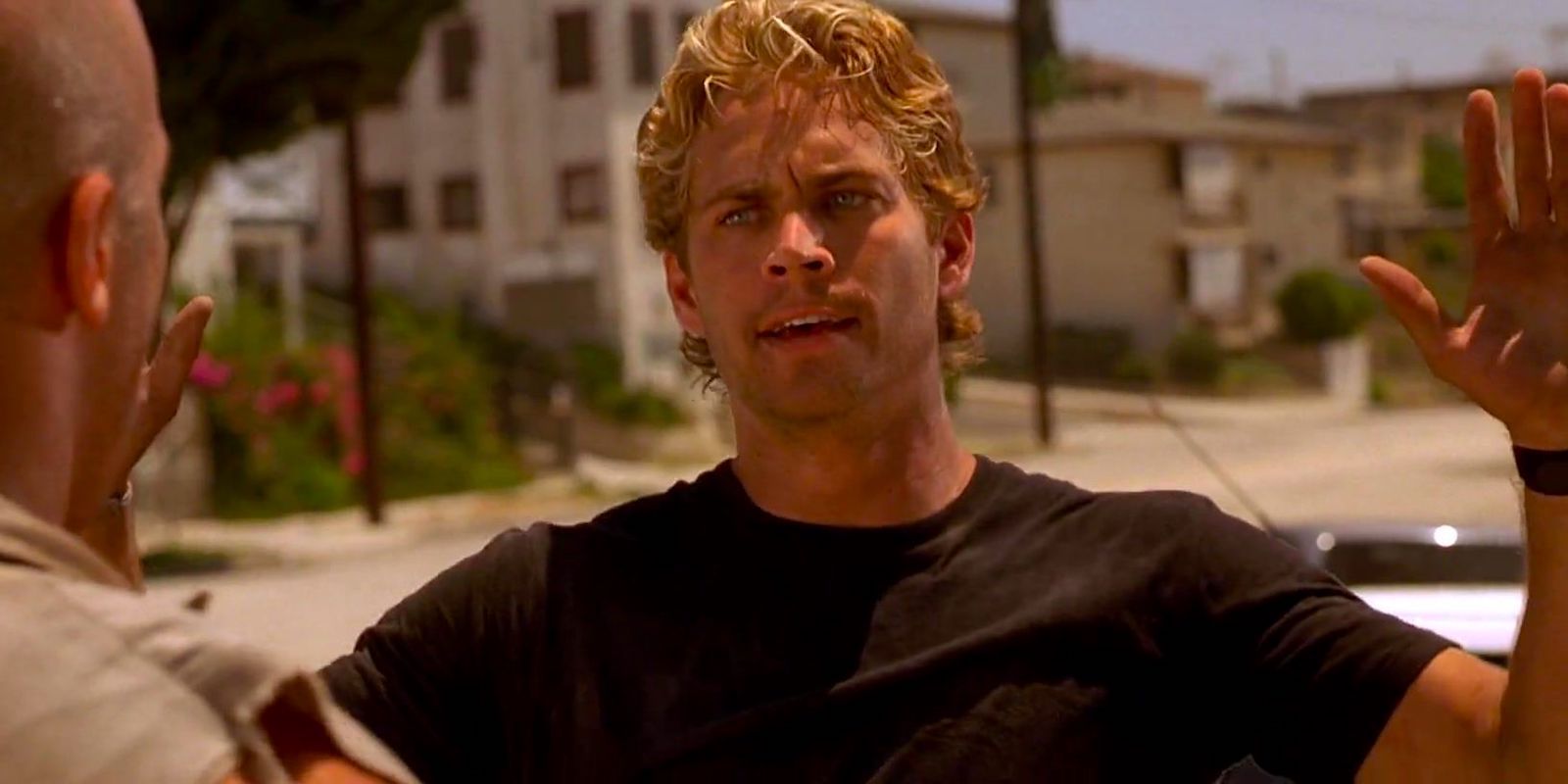 Paul Walker as Brian Holding Up His Hands in the original The Fast and the Furious