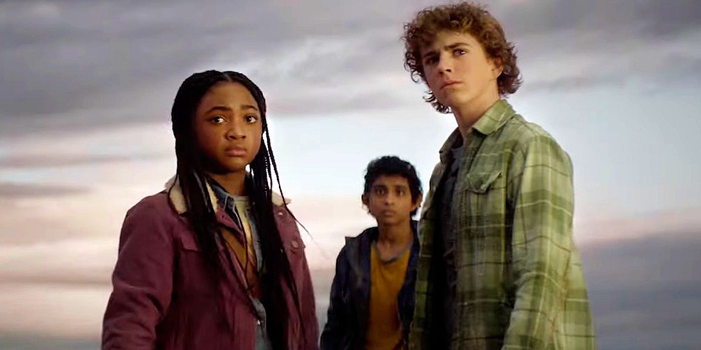 Percy, Annabeth, and Grover standing on a beach in Percy Jackson and the Olympians