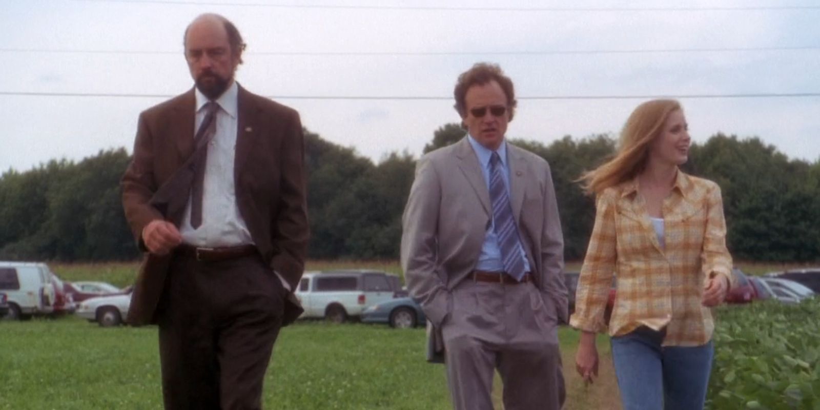 Three staffers look for the missing presidential motorcade.