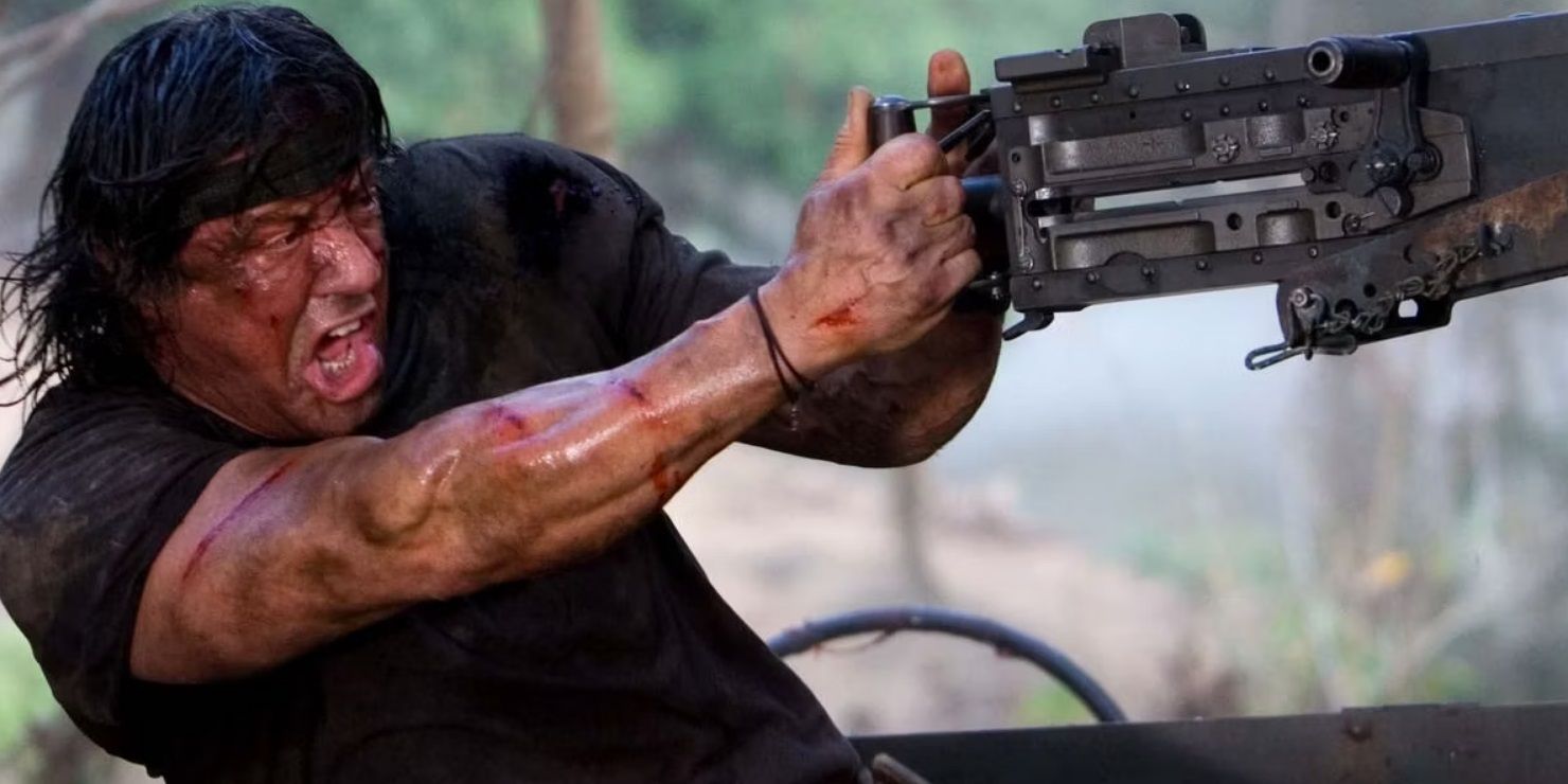 Rambo using a machine gun in Rambo 2008