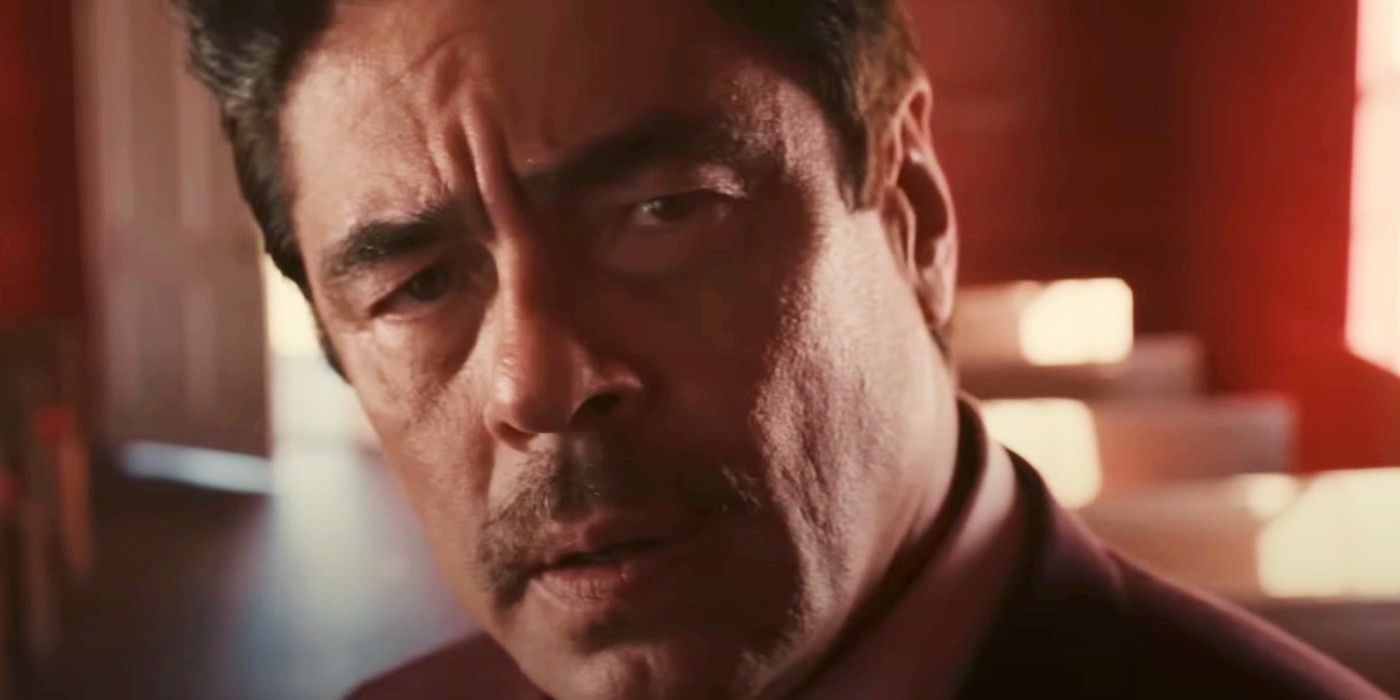 Benicio del Toro furrows his brow and looks worried in Reptile.