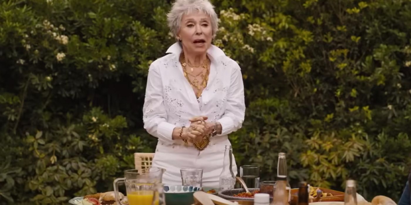 Rita Moreno as Abuelita Toretto standing at table and talking in Fast X