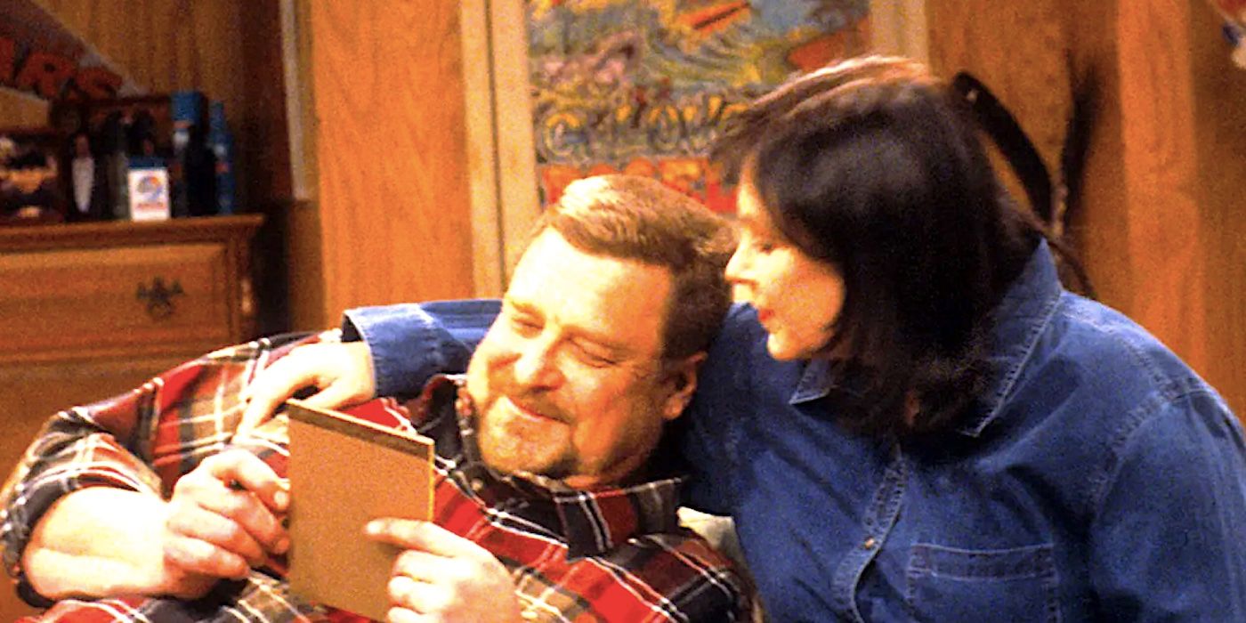 Roseanne Barr and John Goodman as Roseanne and Dan in Roseanne