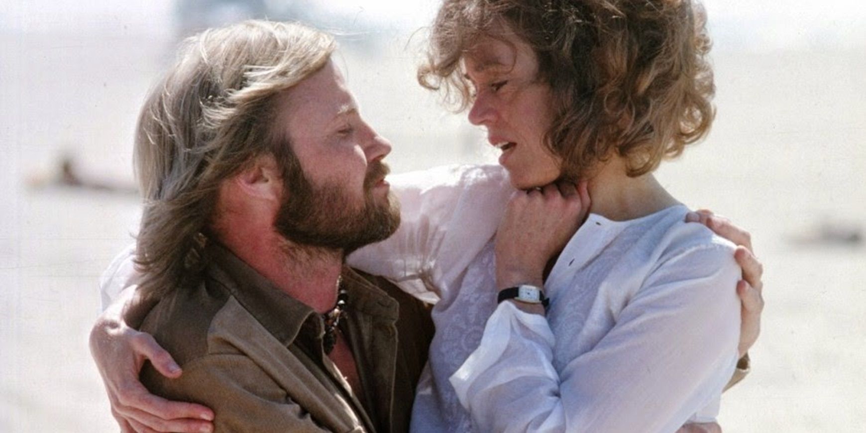 Sally and Luke embrace in Coming Home