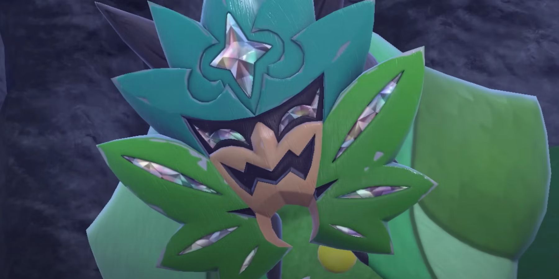 Ogrepon, the green humanoid Pokémon with the teal mask, glowers at the camera. In the background a hill at night.