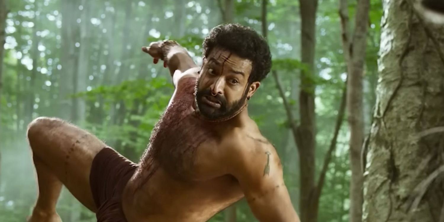 Komaram Bheem jumping to escape a tiger in RRR