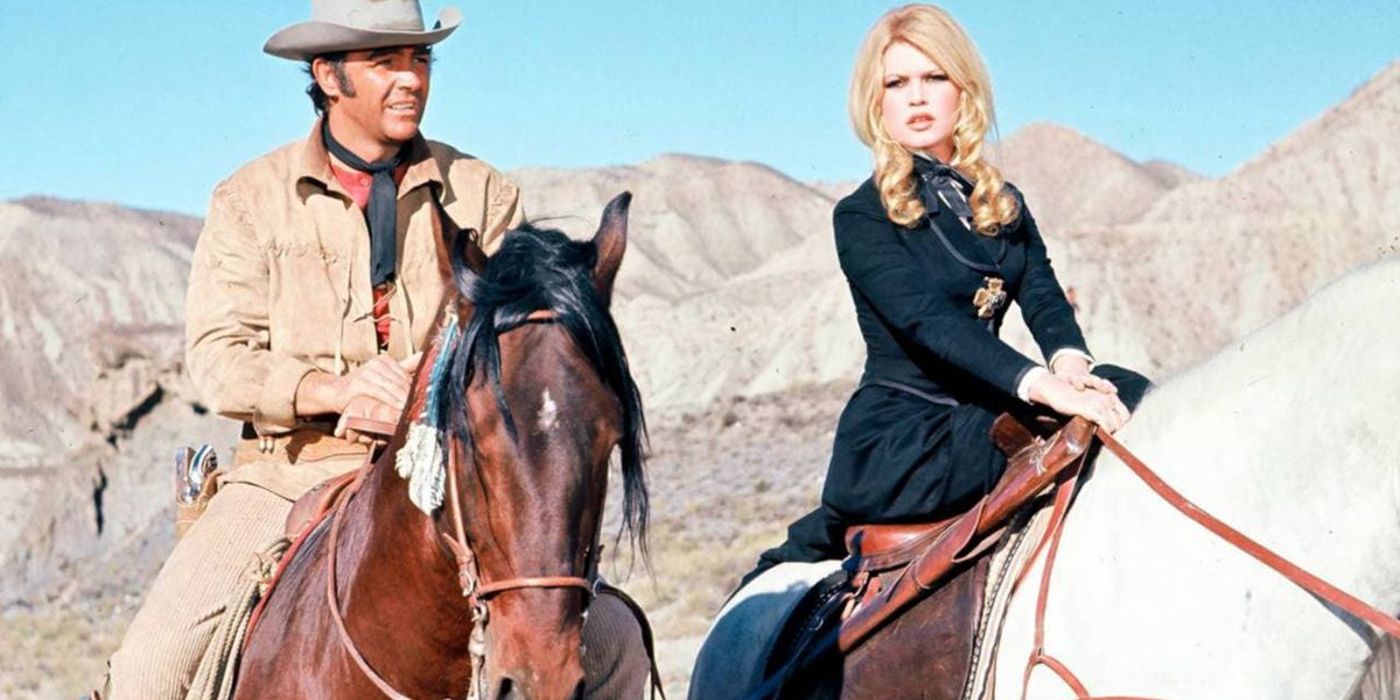 Sean Connery and Brigitte Bardot ride horses through the desert in Shalako