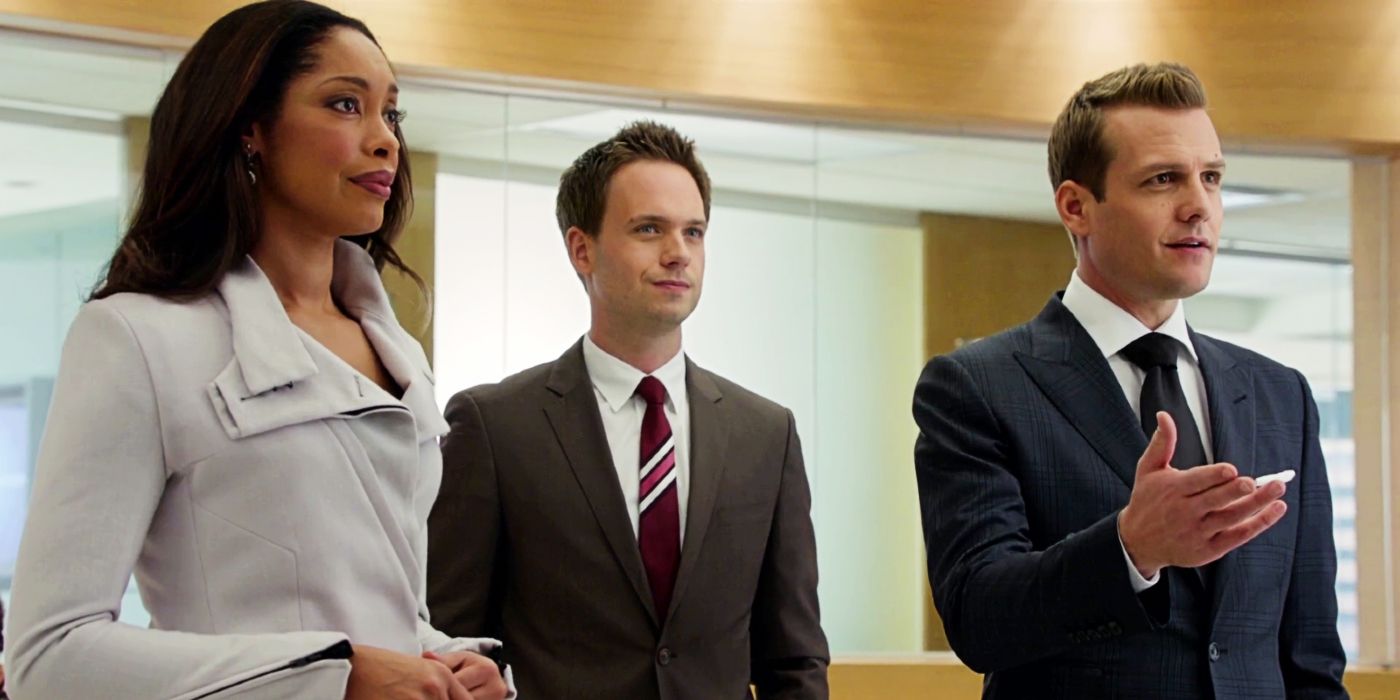 Suits' Jessica, Mike, and Harvey standing in a conference room