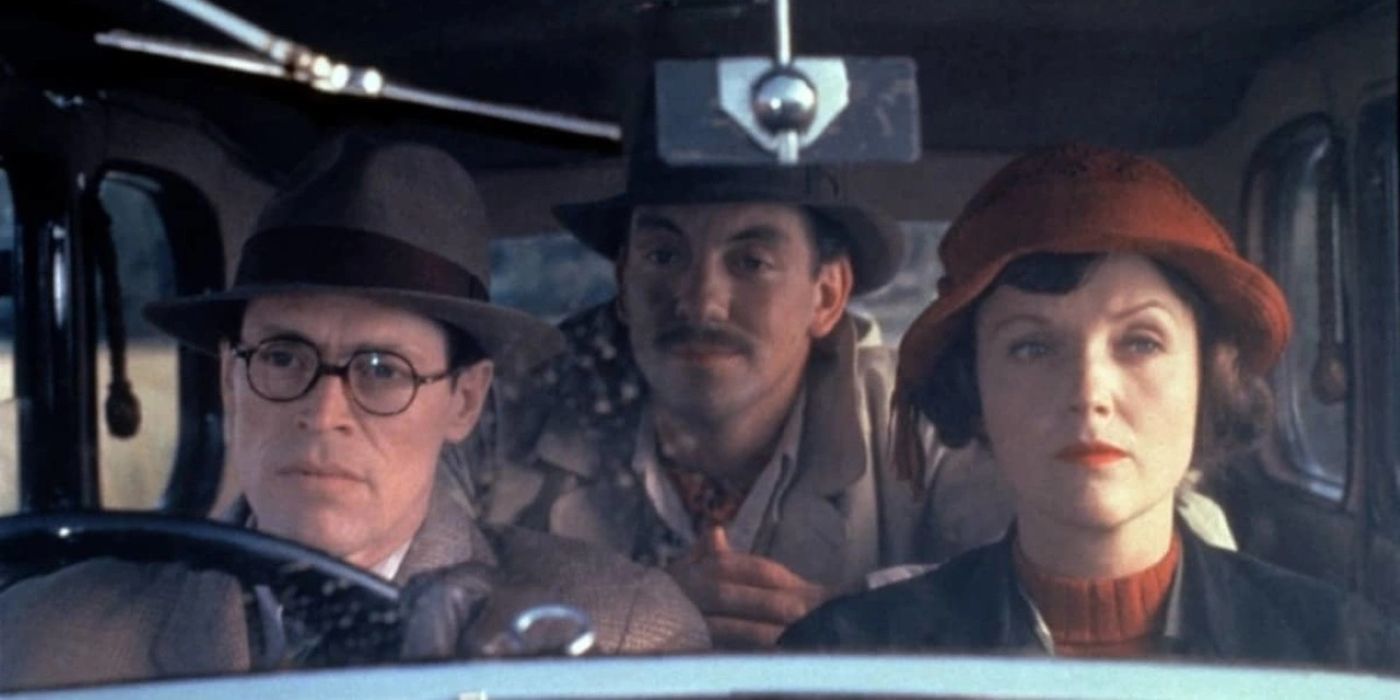 T.S. Eliot, Vivienne Haigh-Wood Eliot, and another man driving in a car in Tom & Viv.