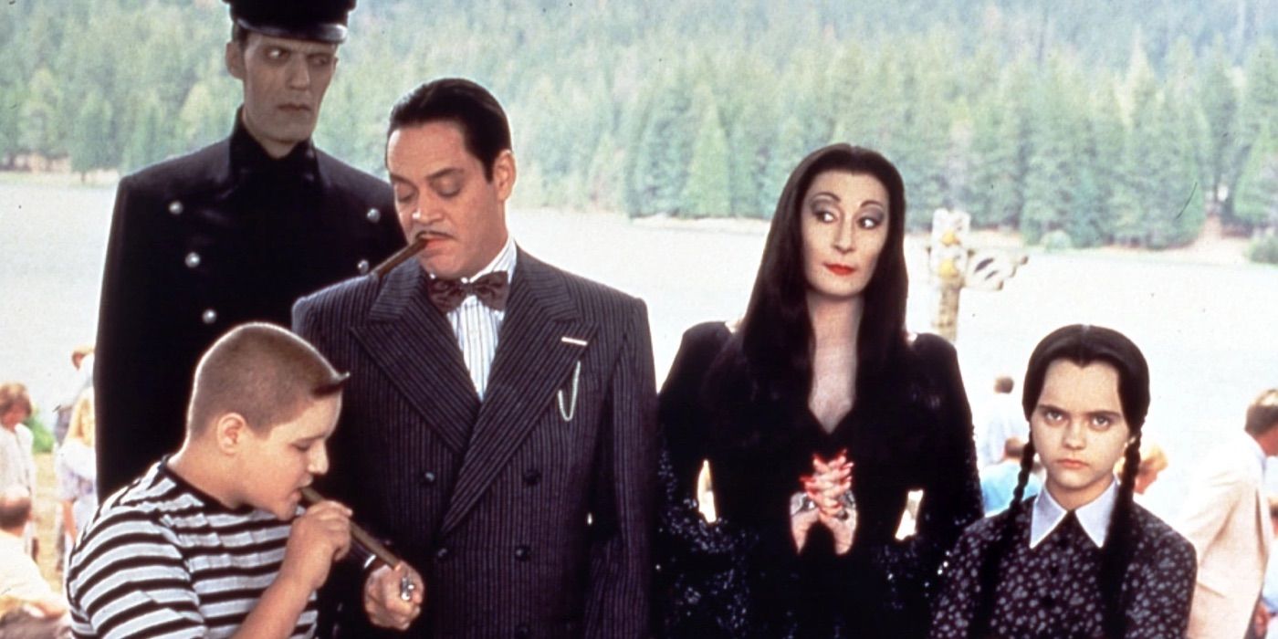 Gomez lights Pugsley's cigar in Addams Family Values