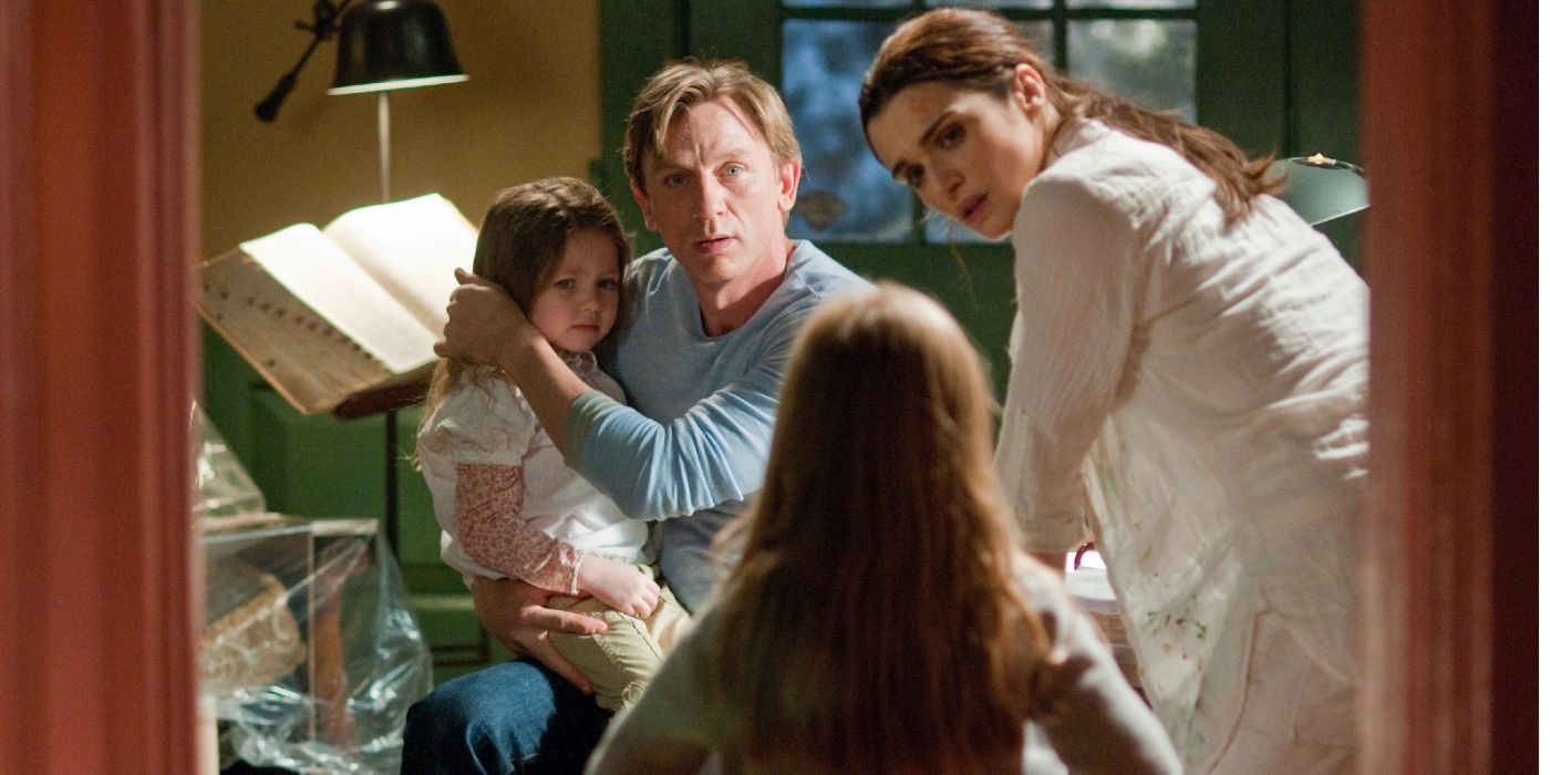The family all looking at each other in Dream House