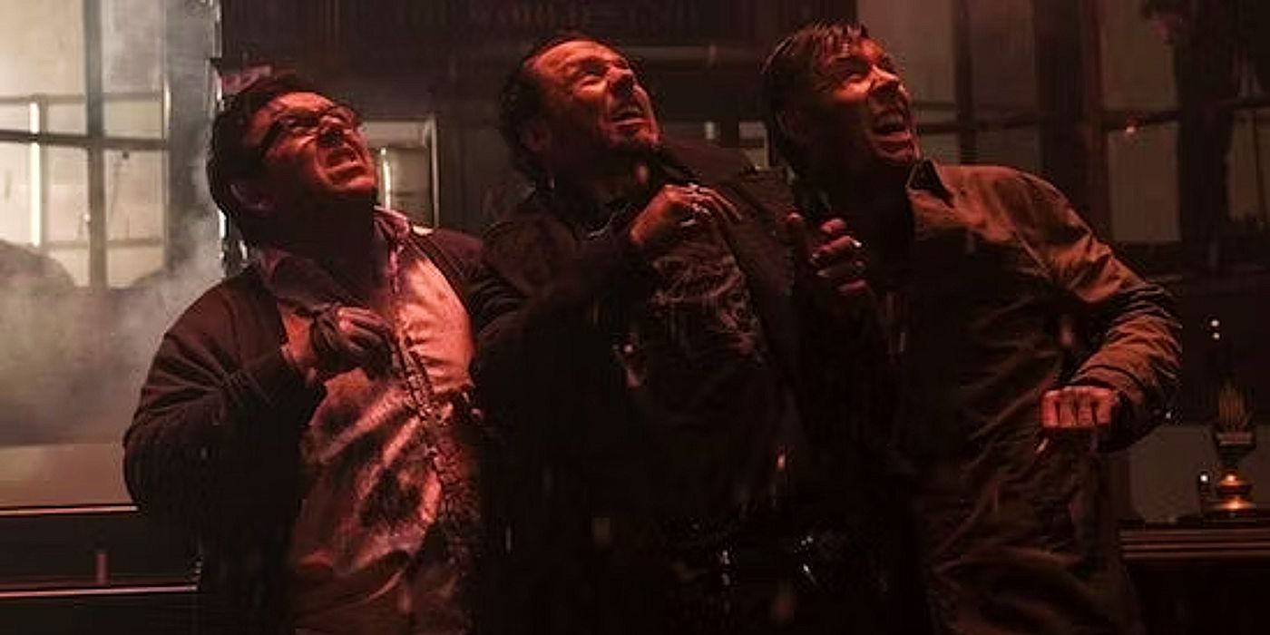 Gary, Andy, and Steven looking up at the red sky in The World&rsquo;s End