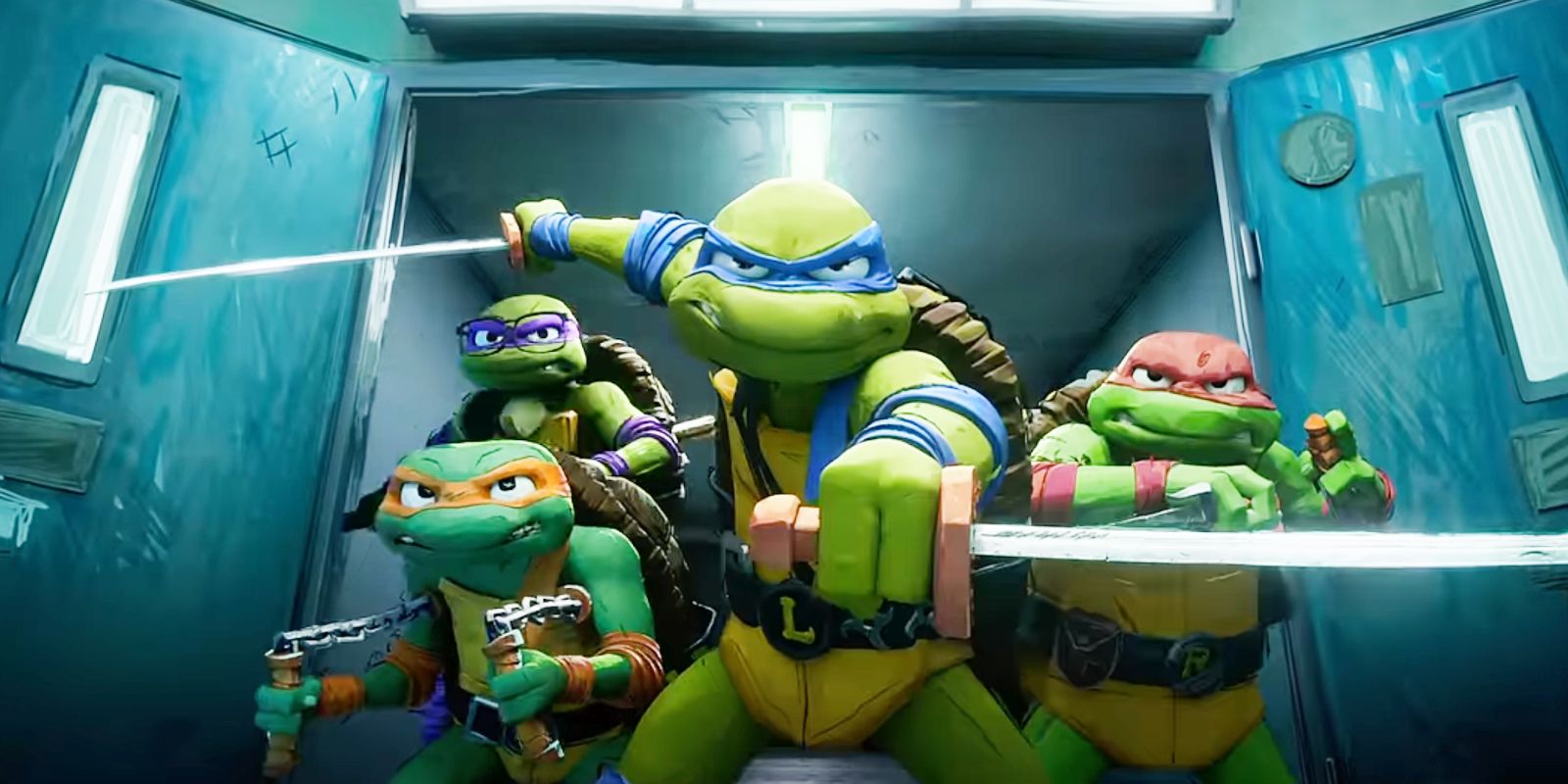 The Teenage Mutant Ninja Turtles standing together, holding their weapons, and ready for combat in TMNT: Mutant Mayhem