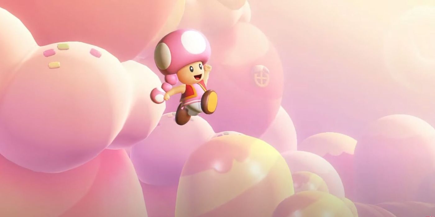 Toadette em Super Mario Bros Wonder em um fundo de céu rosa