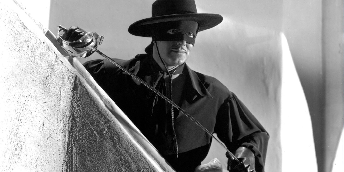 Tyrone Power holding a sword and looking intently in The Mark of Zorro (1)