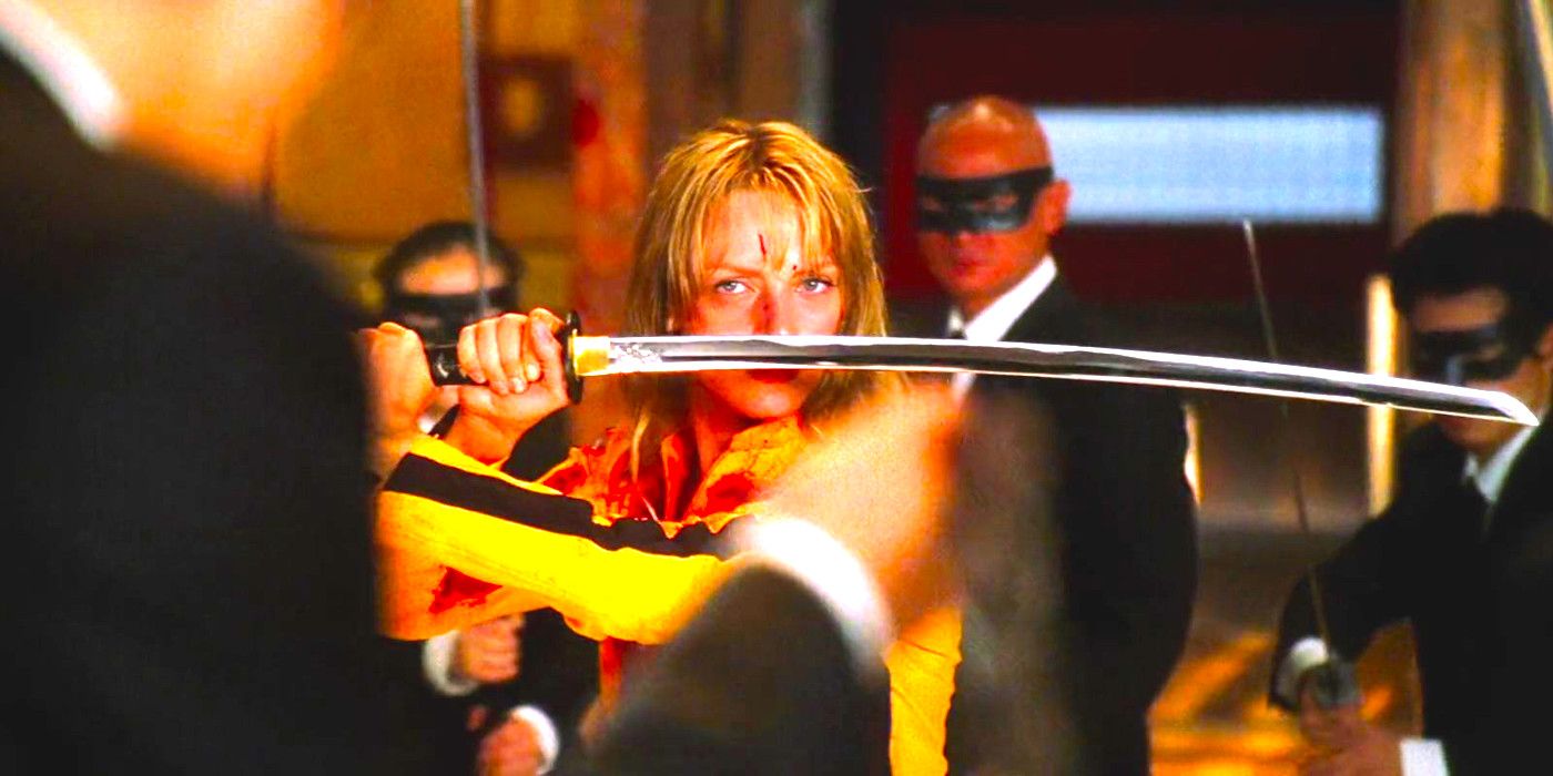 Uma Thurman as The Bride brandishing a sword against multiple makes enemies in Kill Bill
