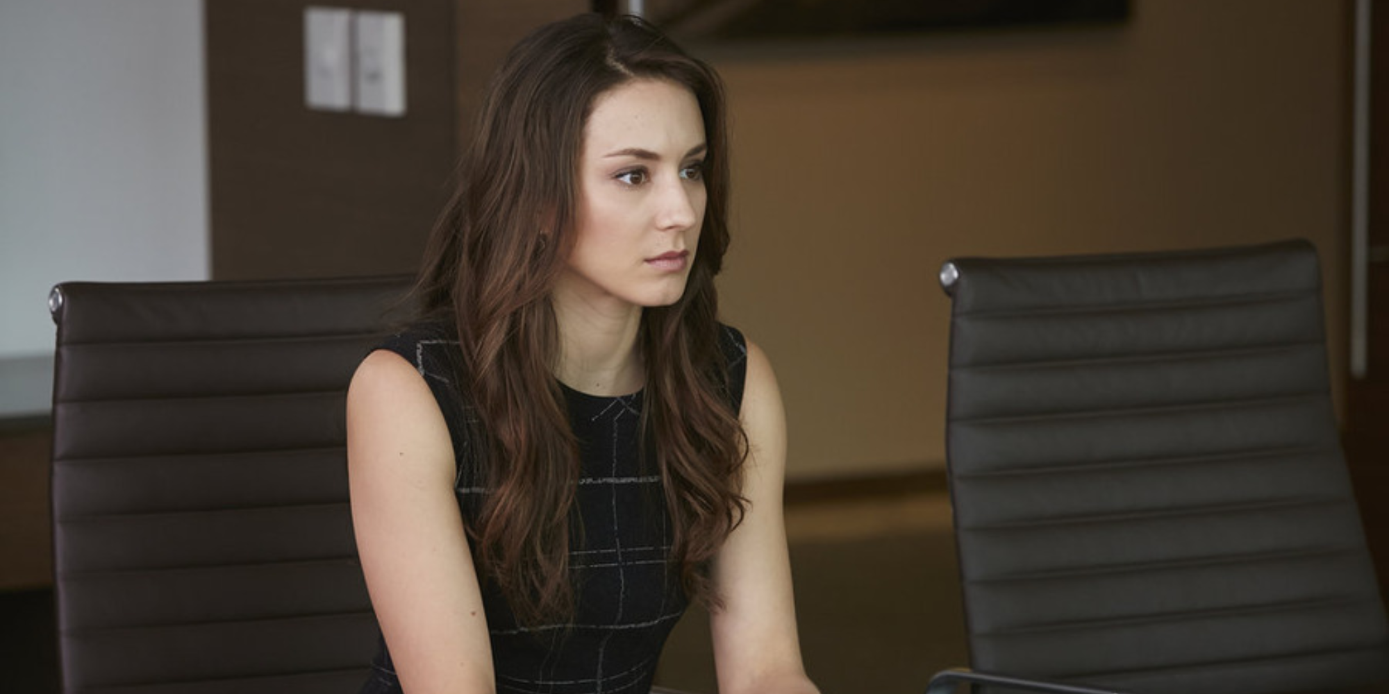 Troian Bellisario portrays a character on Suits.
