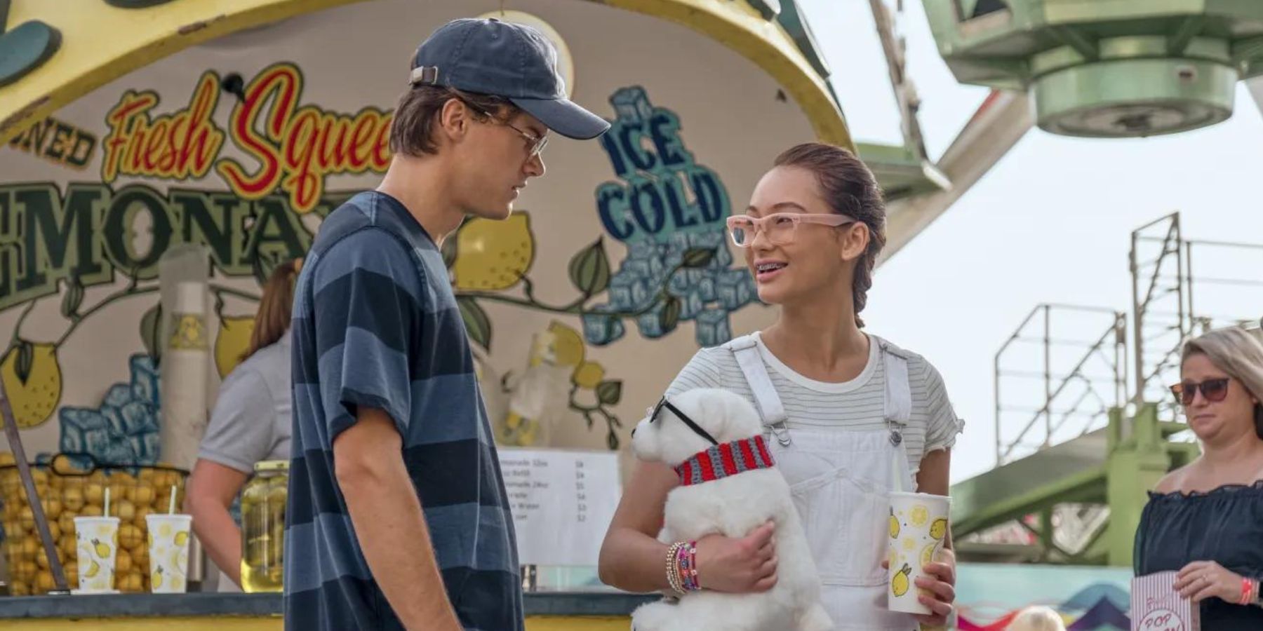 Belly and Conrad at the Cousin boardwalk in a flashback from The Summer I Turned Pretty season 2
