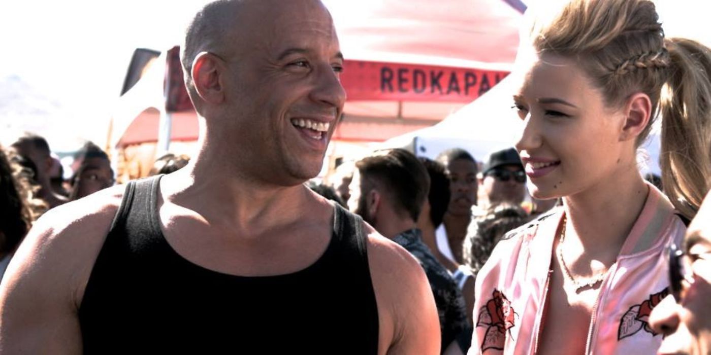 Vin Diesel smiling and Iggy Azalea looking sideways in Furious 7