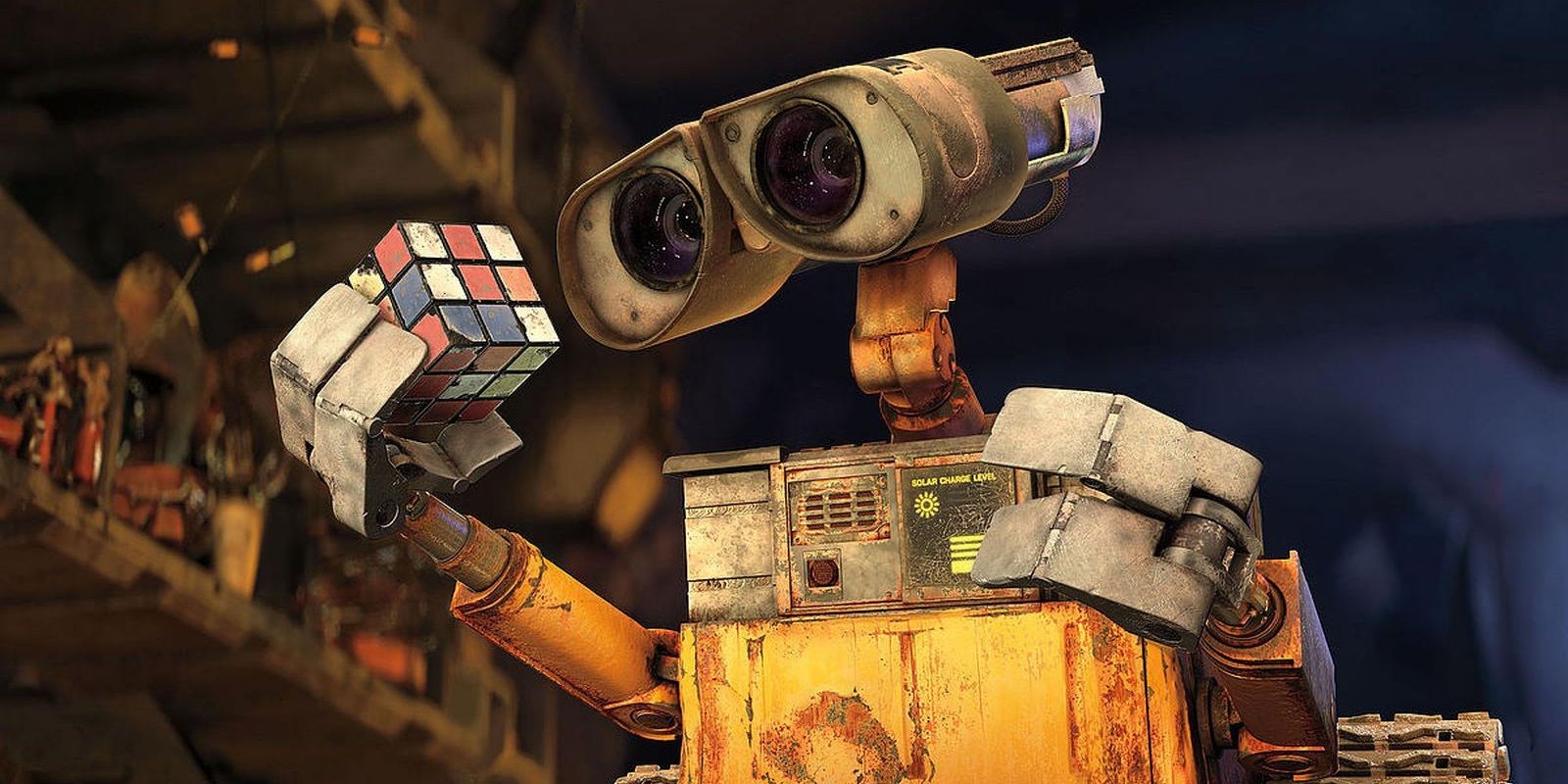 WALL-E looking at a Rubik's Cube