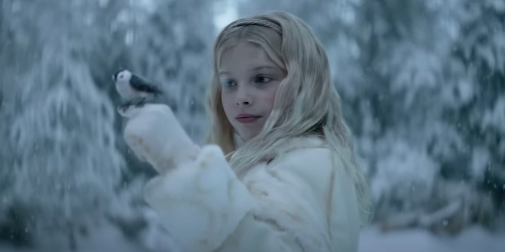 White Haired Girl Holding a Bird in Rebel Moon