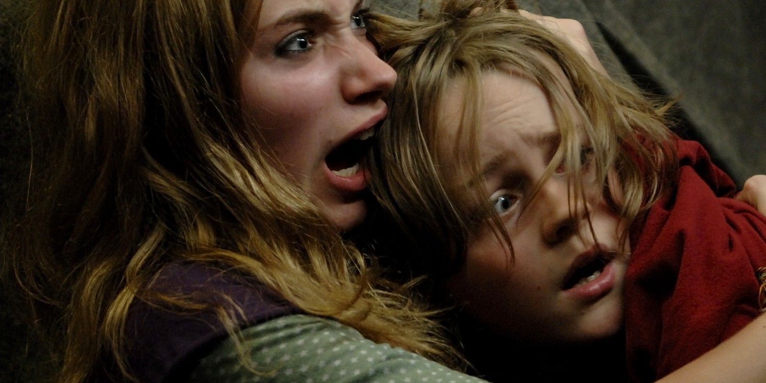 Tammy (Imogen Poots) and Andy (Mackintosh Muggleton) scream in 28 Weeks Later