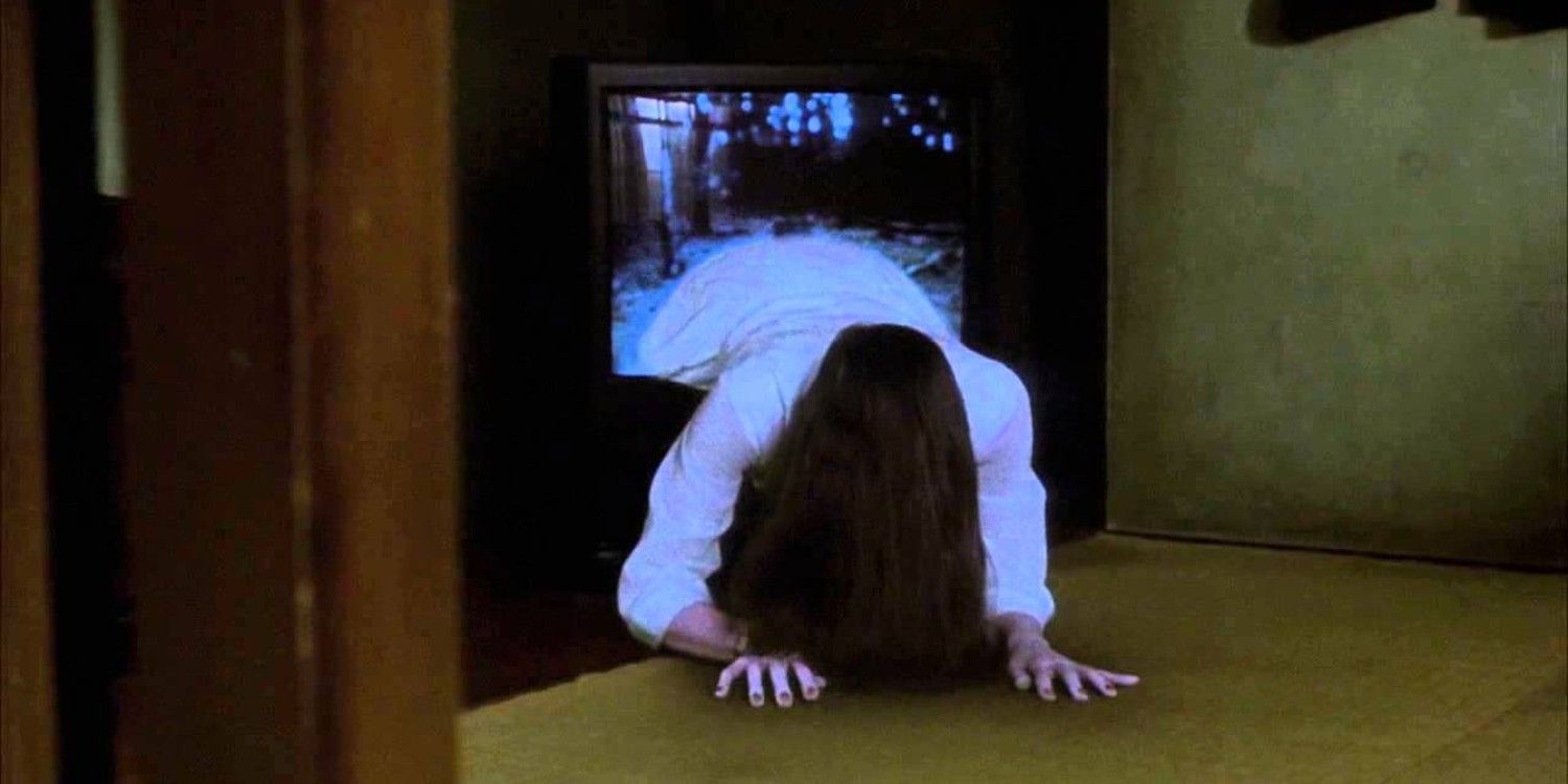 A girl climbing out of the TV in Ringu
