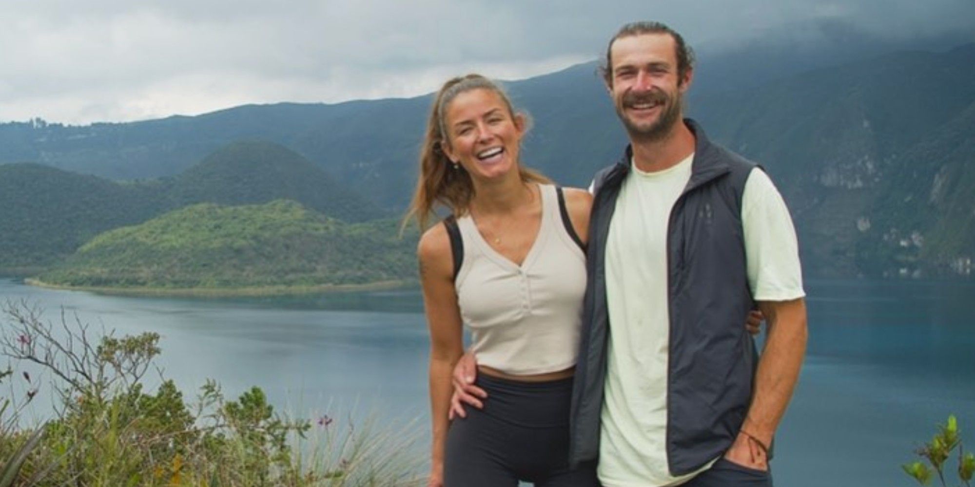 Aesha Scott and her boyfriend Scotty posing together with mountainous landscape background