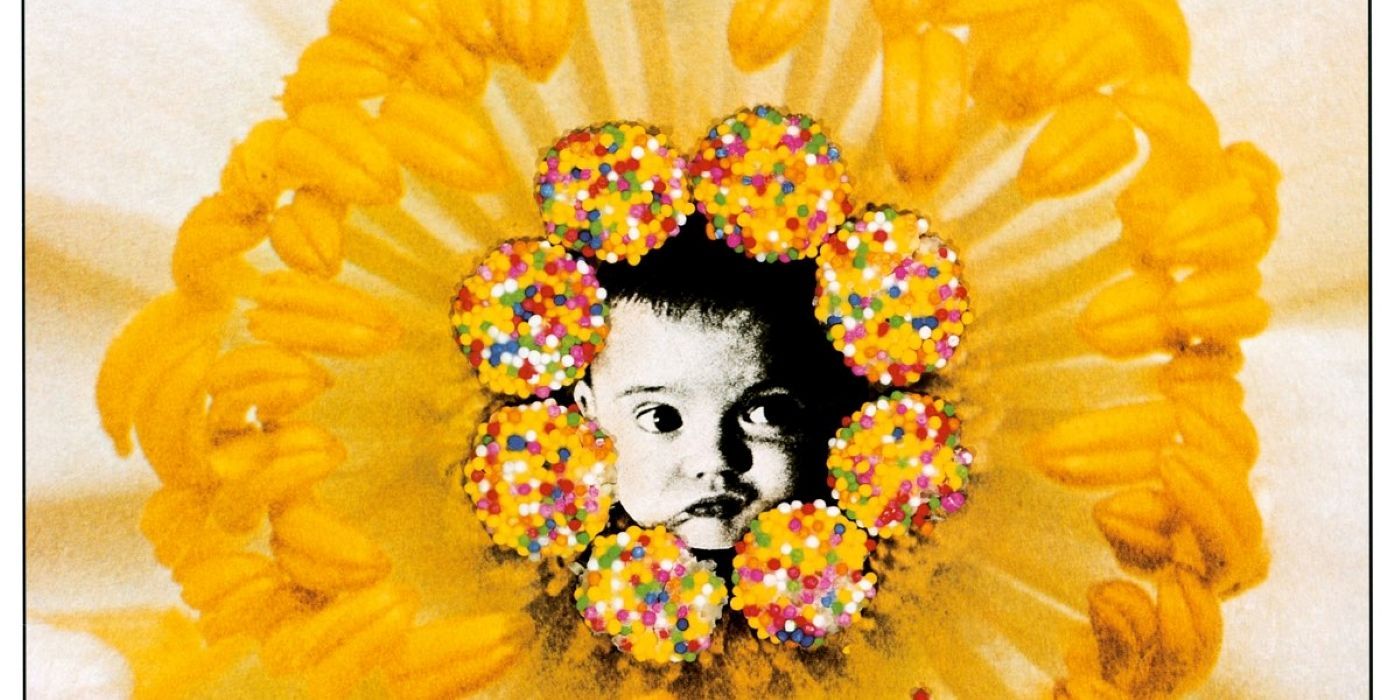 Album cover of Radiohead Pablo Honey with a baby's face surrounded by a flower.
