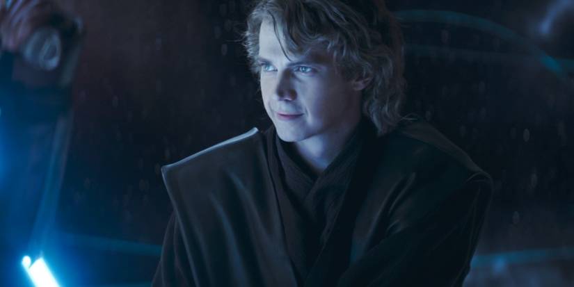 Anakin Skywalker in Ahsoka Episode 5 smiling and holding his lightsaber