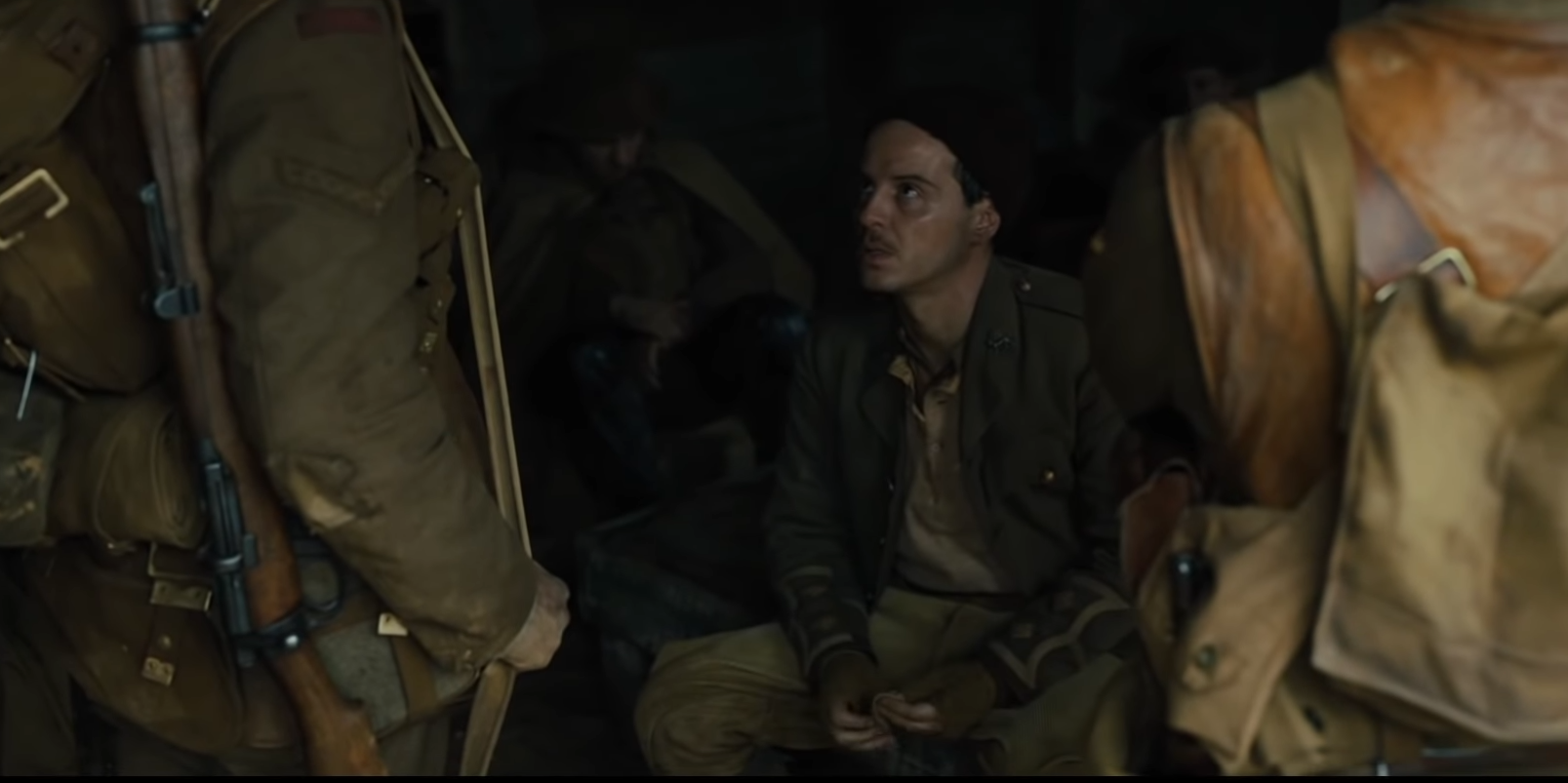 Andrew Scott sitting in a trench in 1917