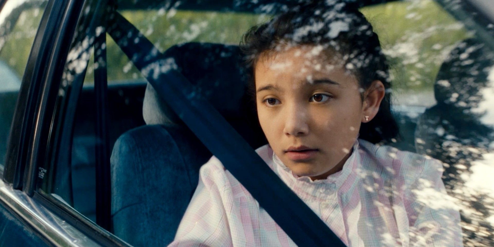 Beans character in a car