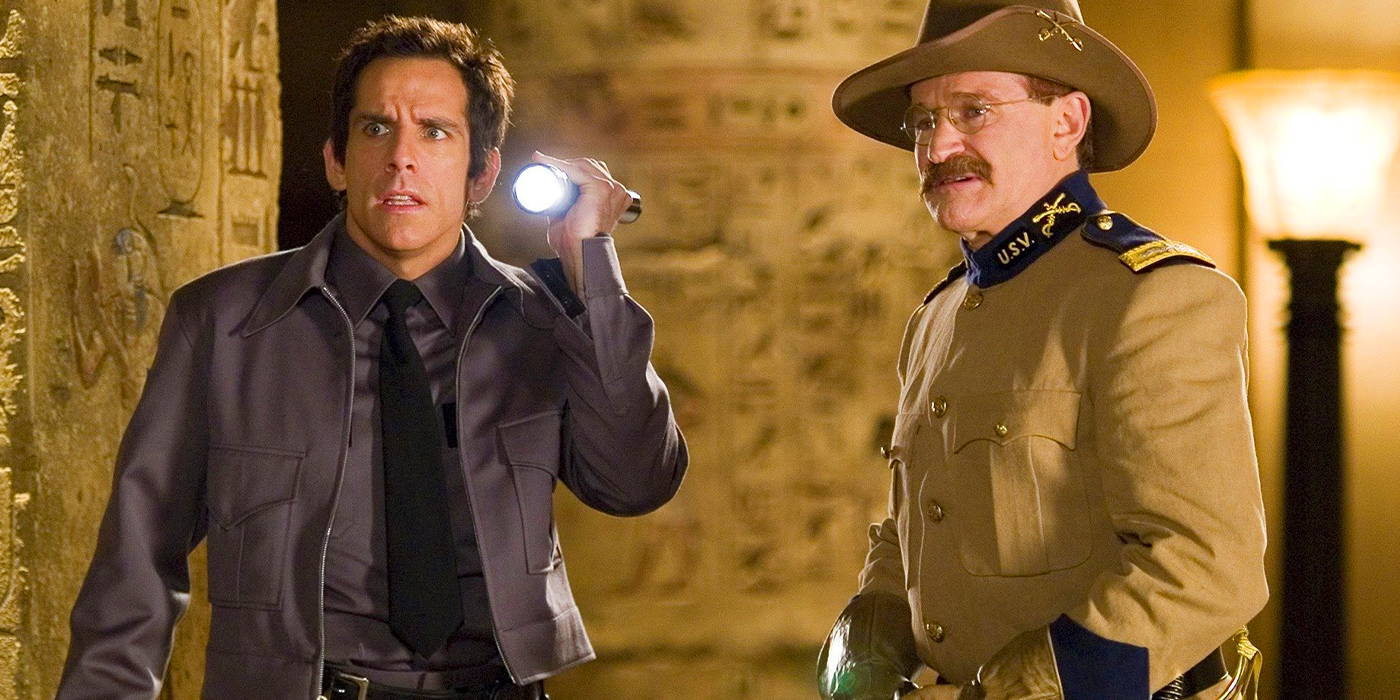 Ben Stiller and Robin Williams as Larry Daley holding a flashlight and Teddy Roosevelt in Night at the Museum