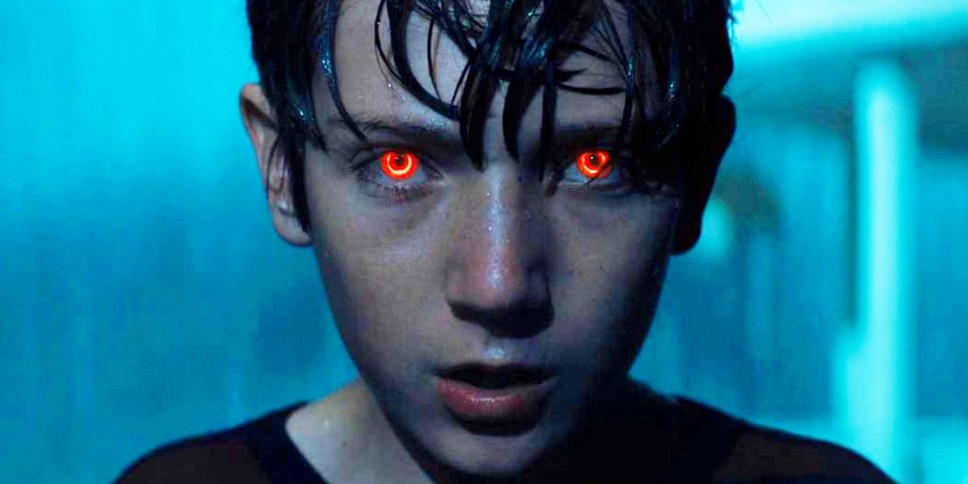 Jackson A. Dunn as Brandon staring into the camera with red eyes in Brightburn.