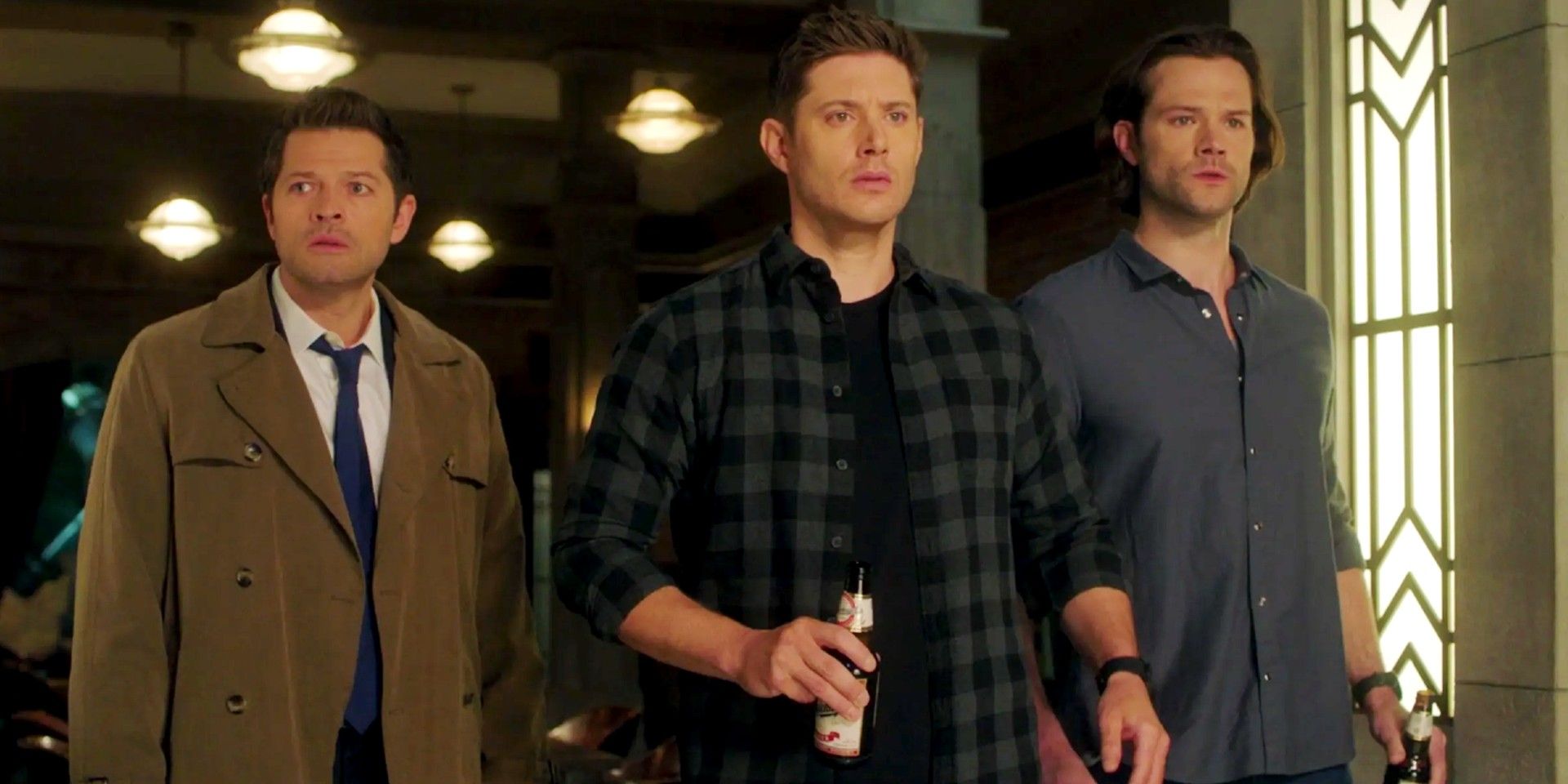 Castiel, Dean, Sam in the Men of Letters bunker looking worried in Supernatural