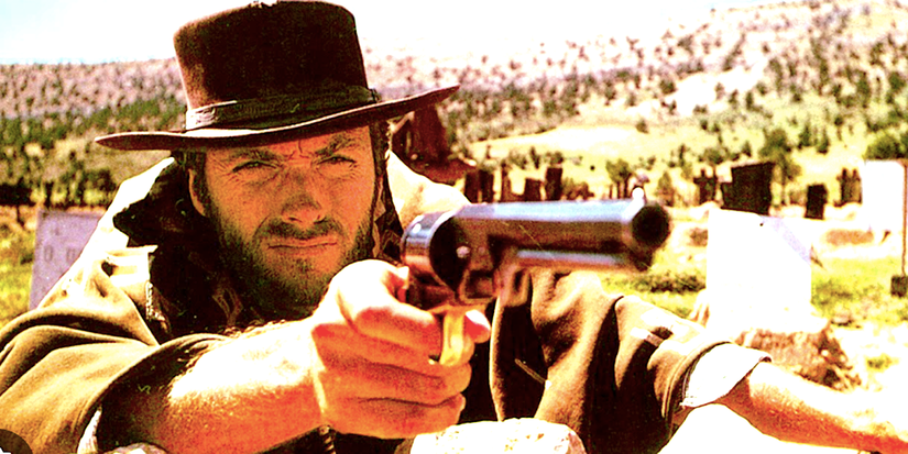 Clint Eastwood as Blondie aims a gun in The Good The Bad and The Ugly
